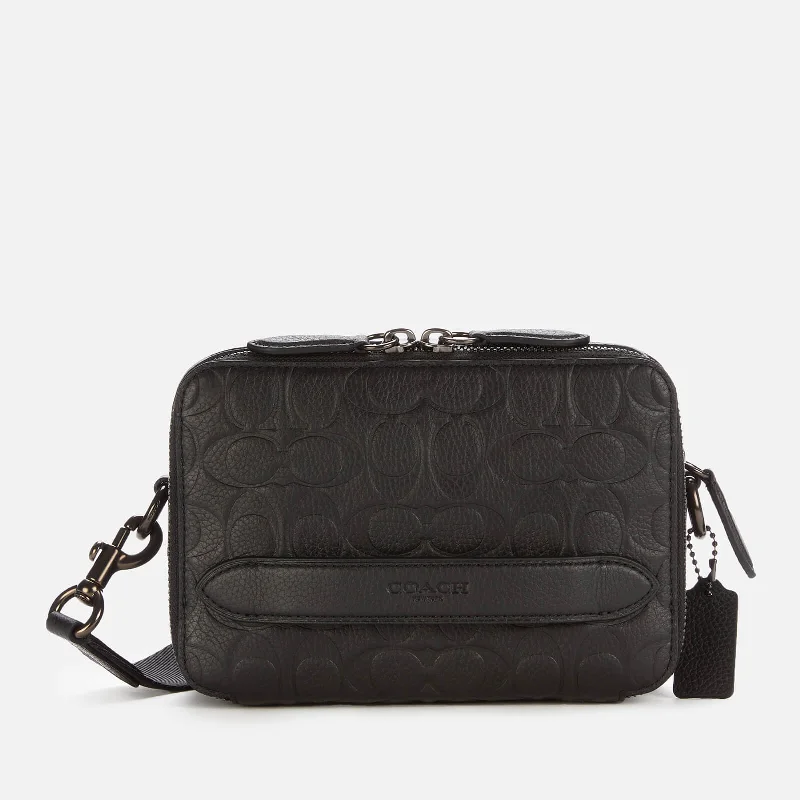 Coach Dempsey bags with a contrast - colored interior for visual interestMen's Charter Signature Leather Crossbody Bag - Black