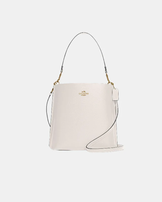 Coach Borough bags with a structured silhouette and a magnetic - snap closureCoach Mollie Bucket Bag