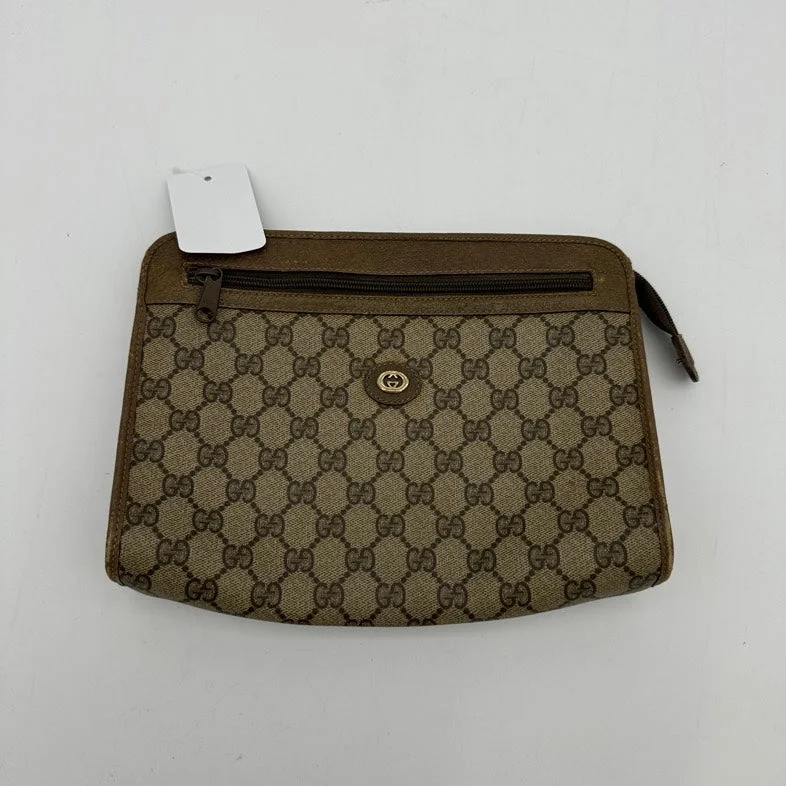 Women Gucci Sylvie bags featuring the signature web stripeGucci Canvas Leather Clutch Wristlet Beige Brown Medium