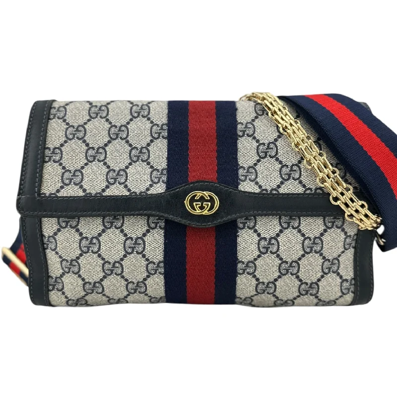 Gucci Marmont bags for women with quilted leather exteriorsGUCCI Medium Navy Coated Canvas Ophidia Clutch with added Strap & Chain