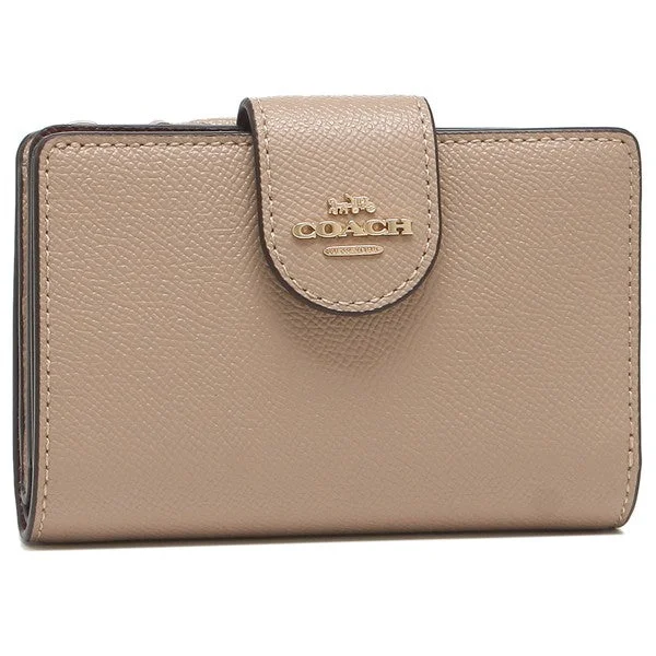 Coach Rogue bags with a detachable shoulder strap for versatile carryingCOACH 6390 Medium Corner Zip Wallet Collection