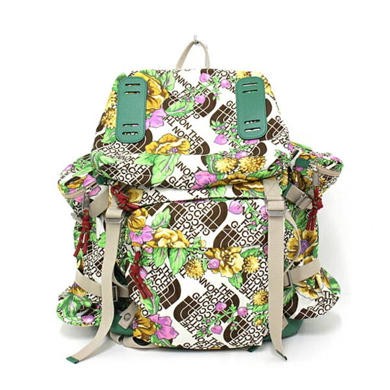 Gucci handbags for women with a metal - framed claspGucci / North Face collaboration Gucci The large floral backpack 650294 green flower