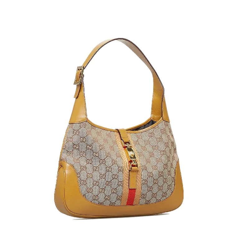 Women Gucci Sylvie bags featuring the signature web stripeGucci Jackie Shoulder Bag Brown GG Canvas