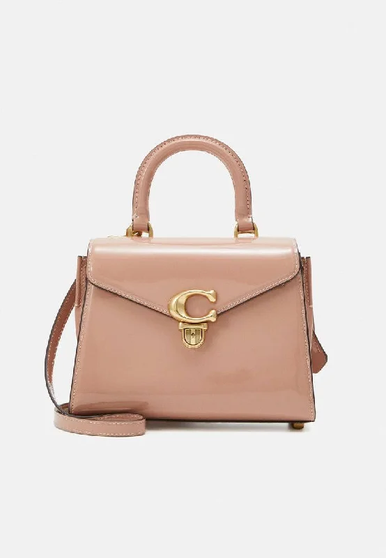 Coach Rogue bags featuring the signature C - hardware for a branded lookCoach Sammy Top Handle 21