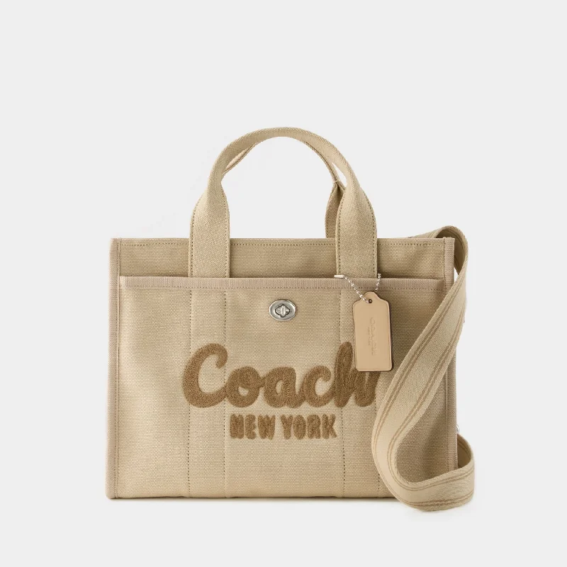 Ladies Coach Tabby bags with a detachable shoulder strapCargo Tote  - Coach - Canvas - White