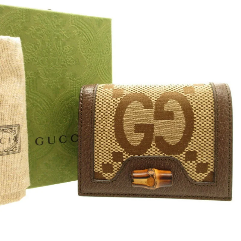 Women Gucci backpacks with a luxurious leather finishGUCCI 658244 Jumbo GG Bamboo Canvas Leather Brown Bifold Wallet 0153