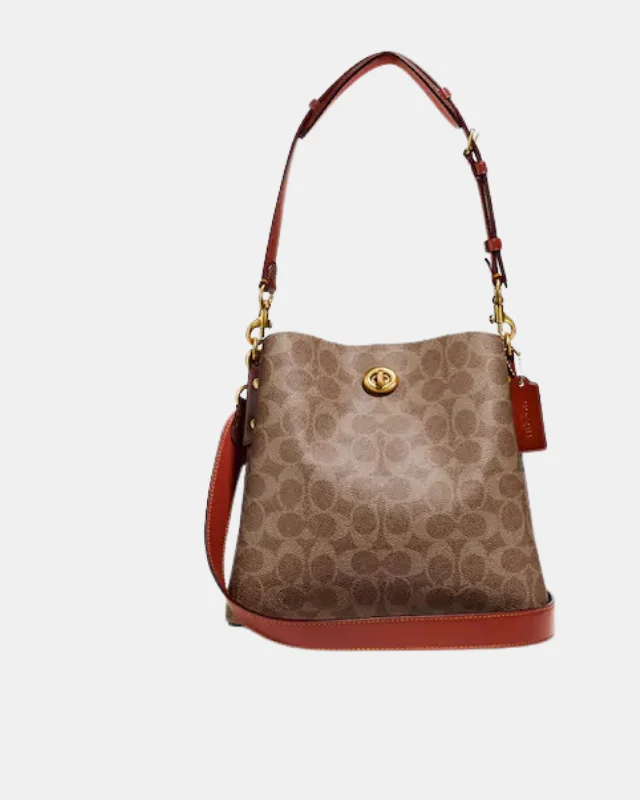 Coach Dempsey bags with a crystal - embellished C - logo for added luxuryCoach Willow Bucket Bag In Signature Canvas