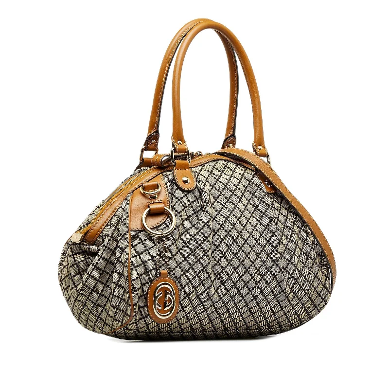 Gucci Marmont bags for women with a contrast - colored interiorGUCCI Diamante Sukey Satchel