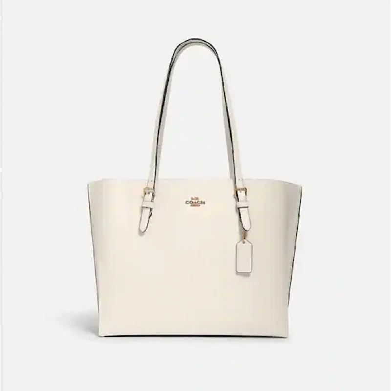 Coach handbags with a beaded trim for a glamorous and elegant lookCoach Mollie Tote Light Saddle