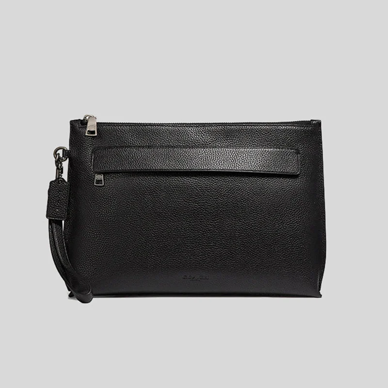 Ladies Coach Borough bags in a pastel shade for a soft and delicate appearanceCOACH Carryall Pouch Black F28614