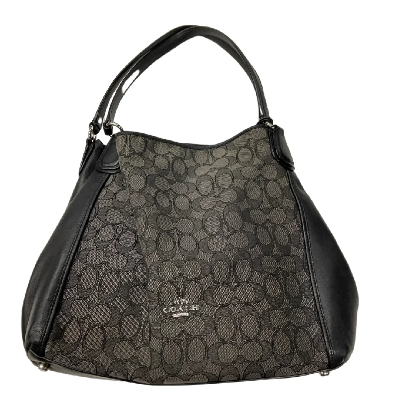 Coach Rogue bags featuring the signature C - hardware for a branded lookHandbag By Coach, Size: Medium