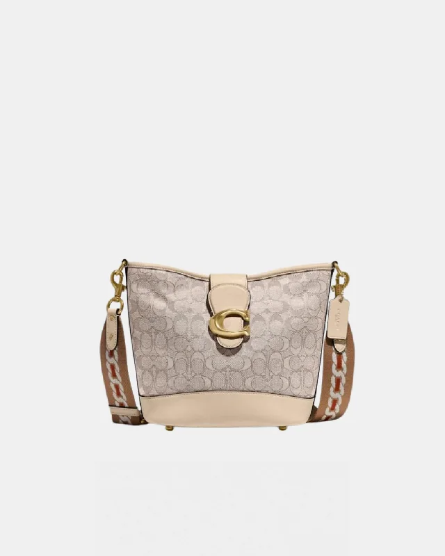 Ladies Coach Tabby bags with gold - toned hardware for a touch of luxuryCOACH TALI BUCKET BAG IN SIGNATURE JACQUARD