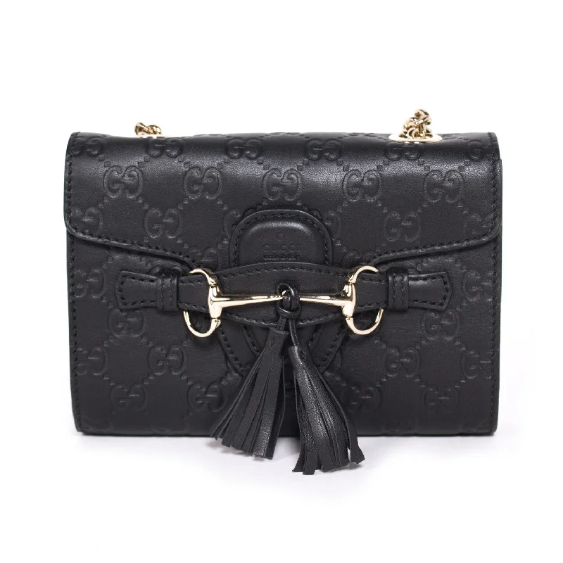 Women Gucci bags with a snap - button closure and a decorative charmGucci Emily Guccissima Small