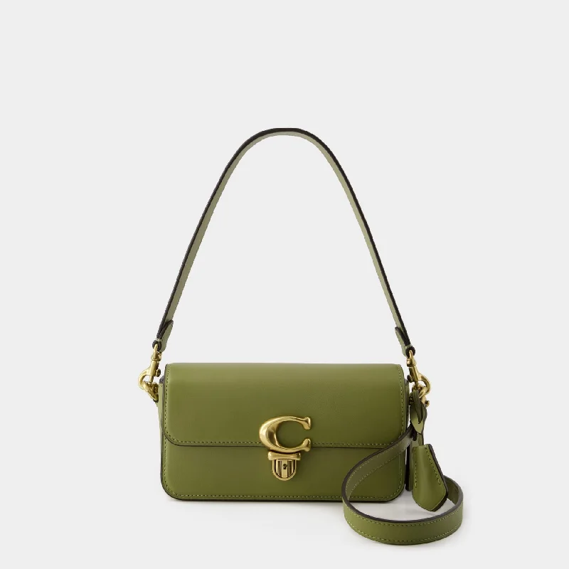 Ladies Coach crossbody bags with a single - strap design for simplicityHobo Studio Baguette - Coach - Leather - Khaki