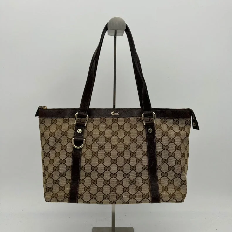 Women Gucci Sylvie bags with a monogram - embossed leatherGucci Canvas Leather Monogram Shoulder Bag Brown Medium Size