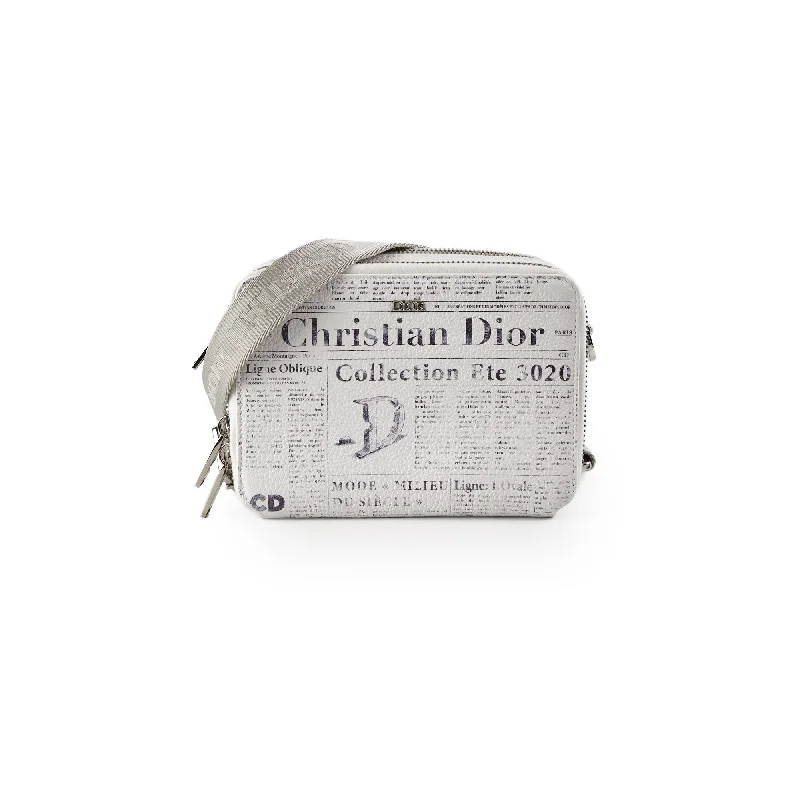 Christian Dior bags with a detachable coin purse insideChristian Dior x Daniel Arsham Newspaper Crossbody Bag