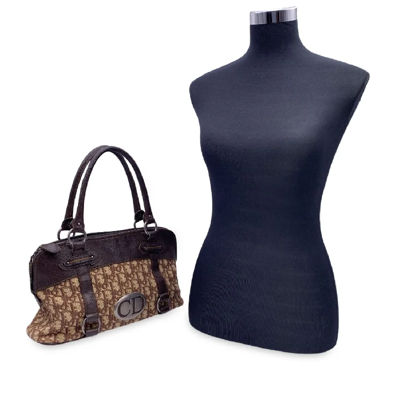 Christian Dior Saddle bags with a distressed leather finishCHRISTIAN DIOR Brown Logo Oblique Canvas Satchel Shoulder Bag