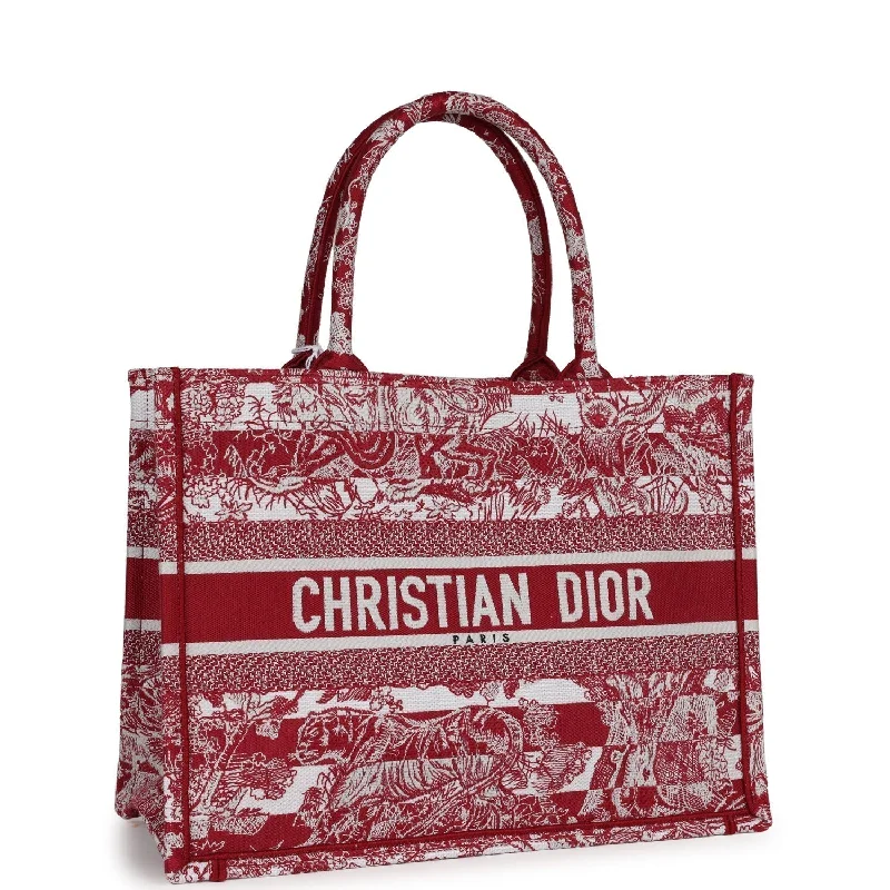 Christian Dior Saddle bags with a distressed leather finishChristian Dior Burgundy Toile De Jouy Stripes Medium Book Tote