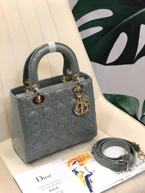 Christian Dior handbags with a snap - button closure and a decorative buckleChristian Dior Medium Lady Dior  Bag