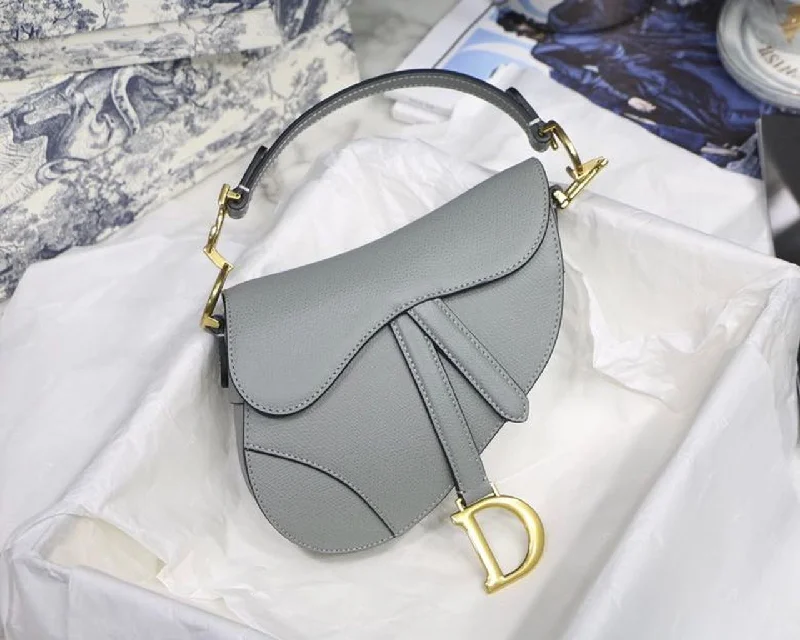 Stylish Christian Dior shoulder bags with a tassel - adorned zipperChristian Dior Saddle Bag Light Blue Grained Gold Toned Hardware Canvas