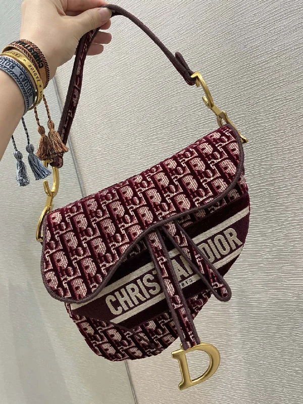 Christian Dior handbags with a snap - button closure and a decorative buckleChristian Dior Saddle Bag Red For Women