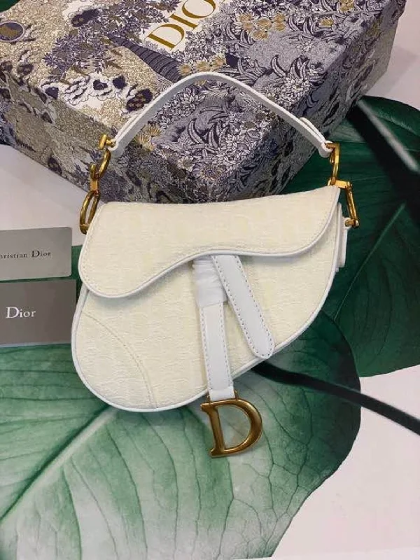 Christian Dior bags with a zip - top closure and multiple compartmentsChristian Dior Saddle Bag White Oblique Embroidered Canvas Gold Toned Hardware