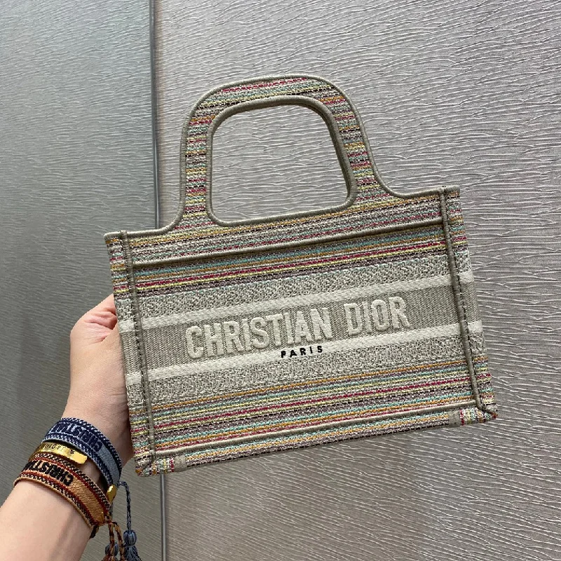 Christian Dior Saddle bags with a distressed leather finishChristian Dior Small Book Tote Bag Canvas Stripes Embroidery