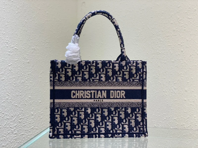 Christian Dior bags with a side - pocket for holding a water bottleChristian Dior Small Book Tote Blue