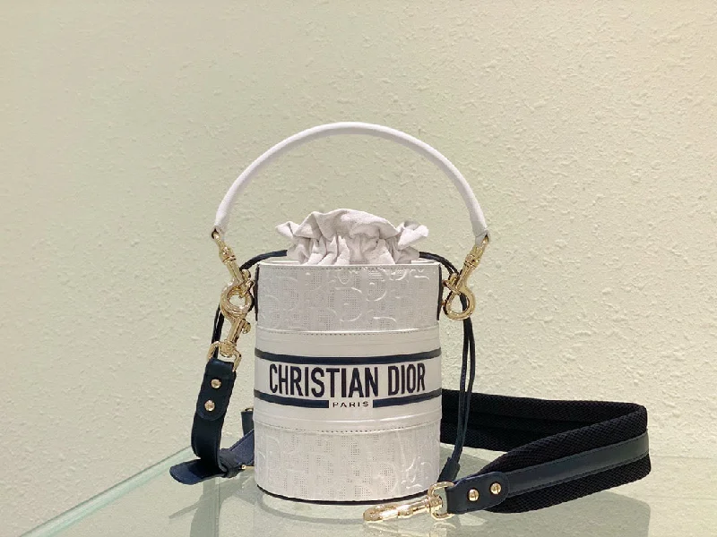 Christian Dior tote bags with a printed Dior logo on the frontChristian Dior Small Vibe Bucket Bag White