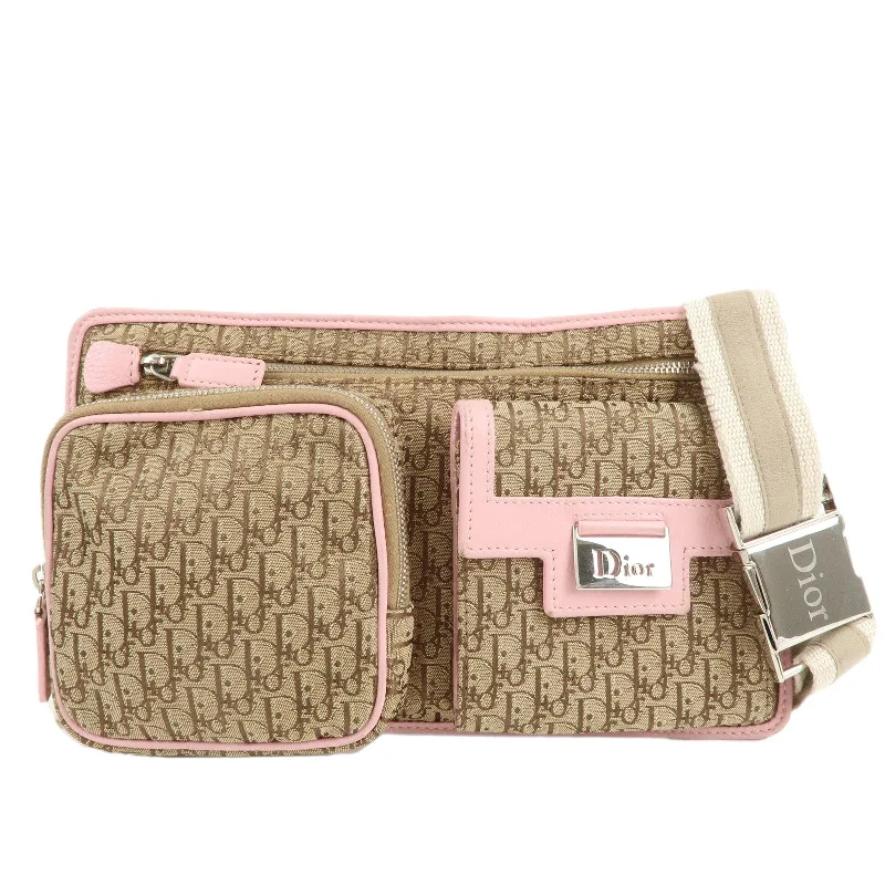 Contemporary Christian Dior handbags with a unique shapeChristian Dior Trotter Canvas Leather Waist Bag Beige Pink