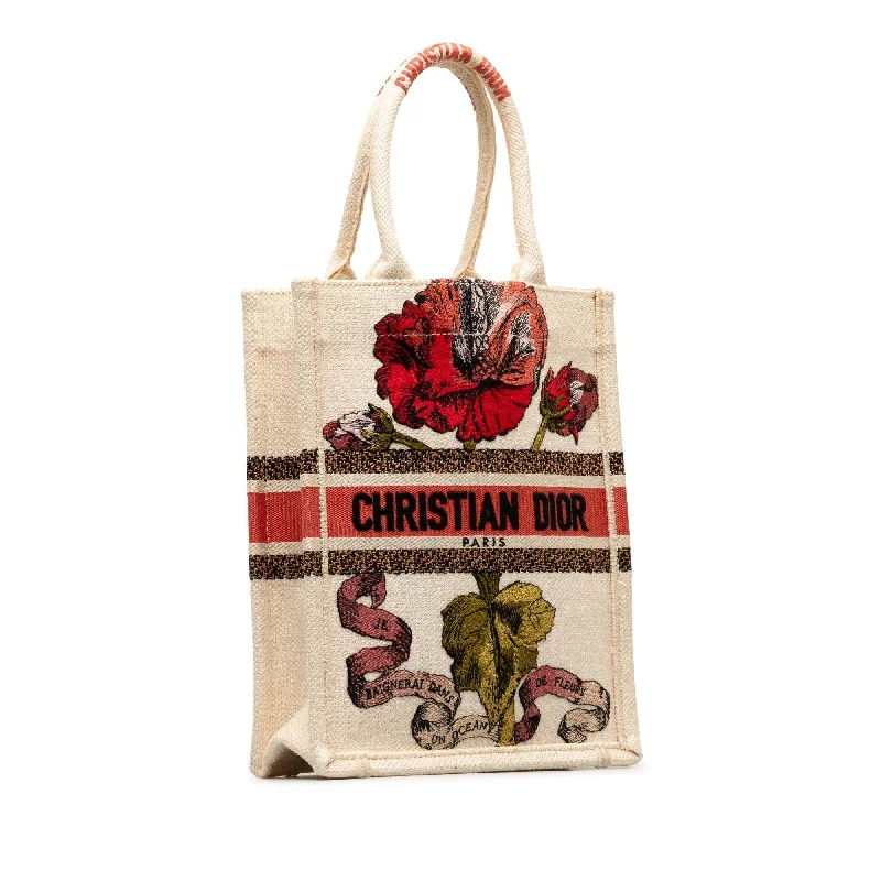 Christian Dior bags with a side - pocket for holding a water bottleDior Fleurs Bibliques Embroidery Vertical Book Tote (LStWkg)