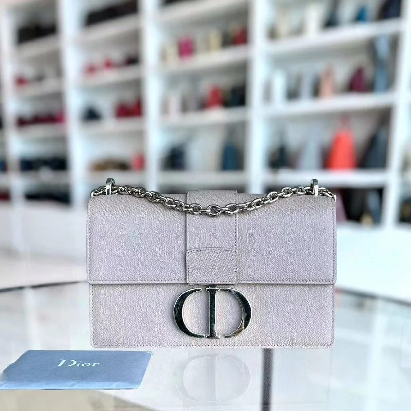 Christian Dior handbags with a snap - button closure and a decorative buckleMontaigne 30 East West Grained Calfskin Light Pink Golden Hardware