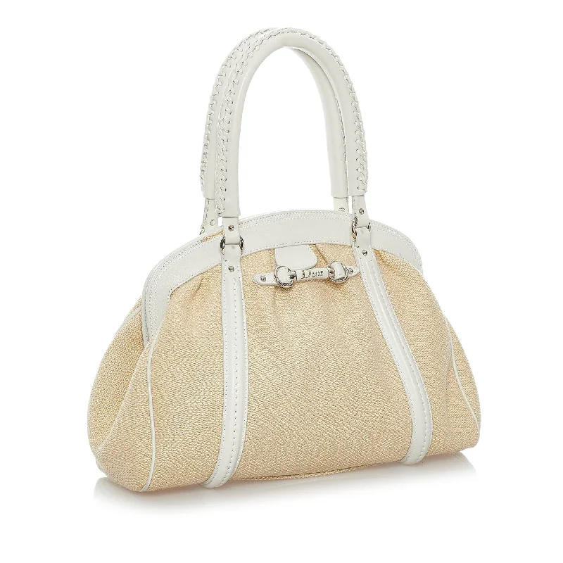 Christian Dior backpacks with a sleek, minimalist silhouetteDior My Dior Frame Raffia Handbag (SHG-30427)